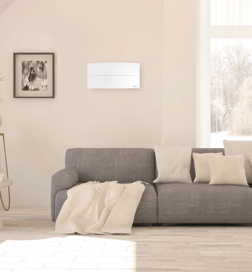 Wandwohnraumlüftung Flow Plus in einem Wohnzimmer