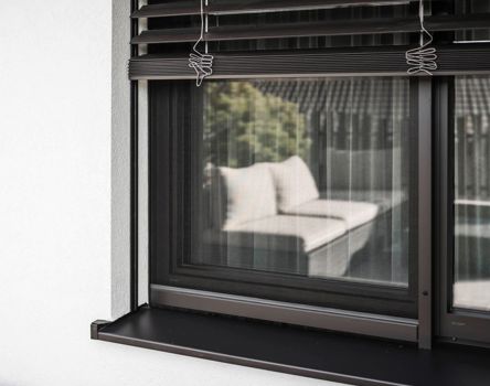Projekt: Wohnhaus Meransen - Tip Top Fenster & Systeme - Fenster und Beschattung