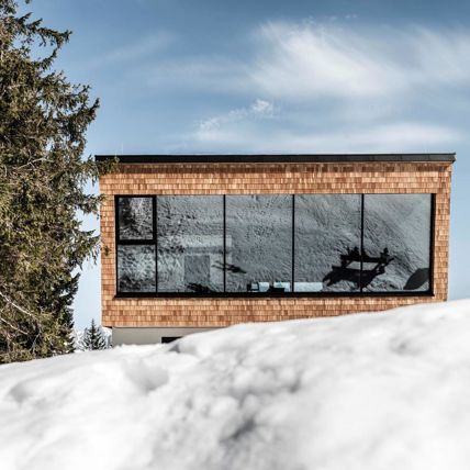 Projekt: Starthaus am Hahnenkamm Kitzbühel - Tip Top Fenster & Systeme - Hebe-Schiebetüren und Verglasungen aus Südtirol