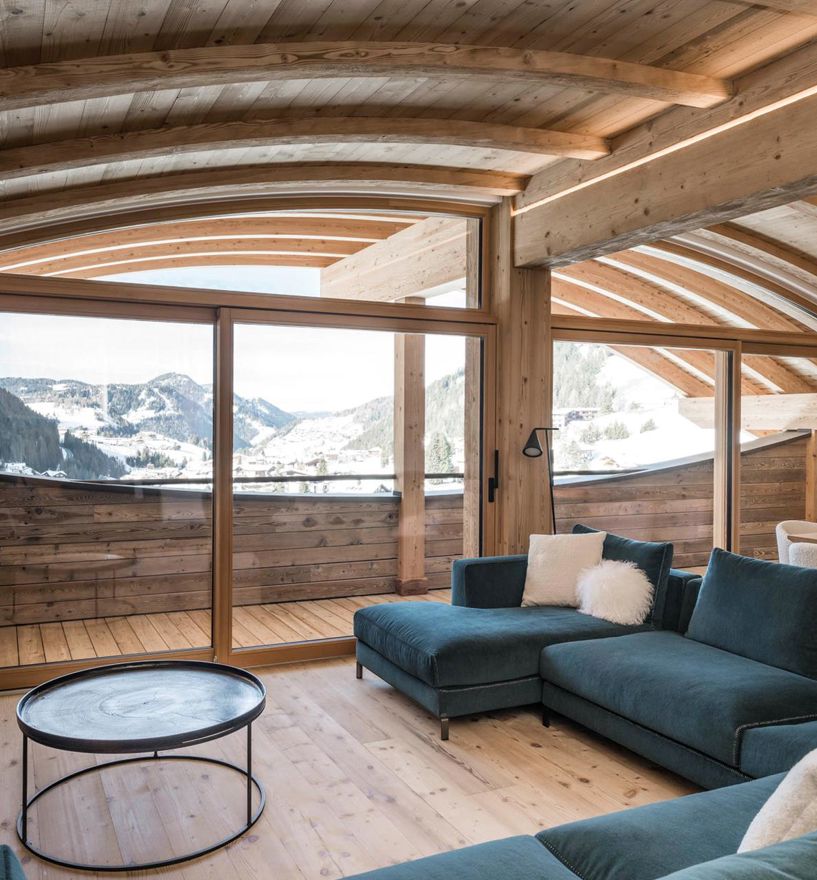 Das Wohnzimmer mit Balkon und Hebe-Schiebetür Classic