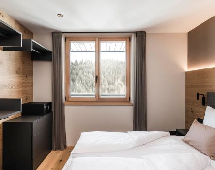 Finestre in legno Climatop 92 in una camera da letto